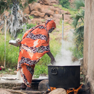 a woman is cooking